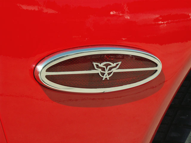 1997-2004 Corvette DRESS UP YOUR C5 CORVETTE WITH THIS POLISHED STAINLESS STEEL CROSSED FLAG SIDE MARKER TRIM KIT. MAD